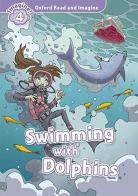Swimming with dolphins. Oxford read & imagine 4. Con CD edito da Oxford University Press